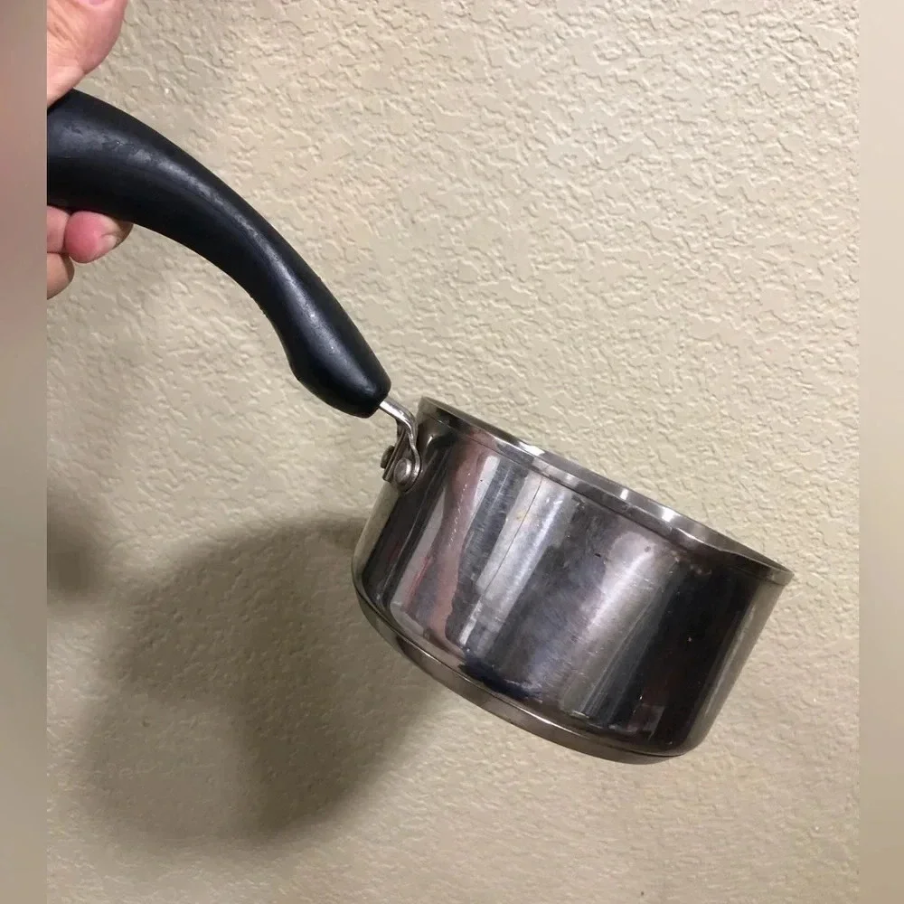 VTG FARBERWARE 1QT SAUCE PAN BLACK HANDLE AND METAL RING